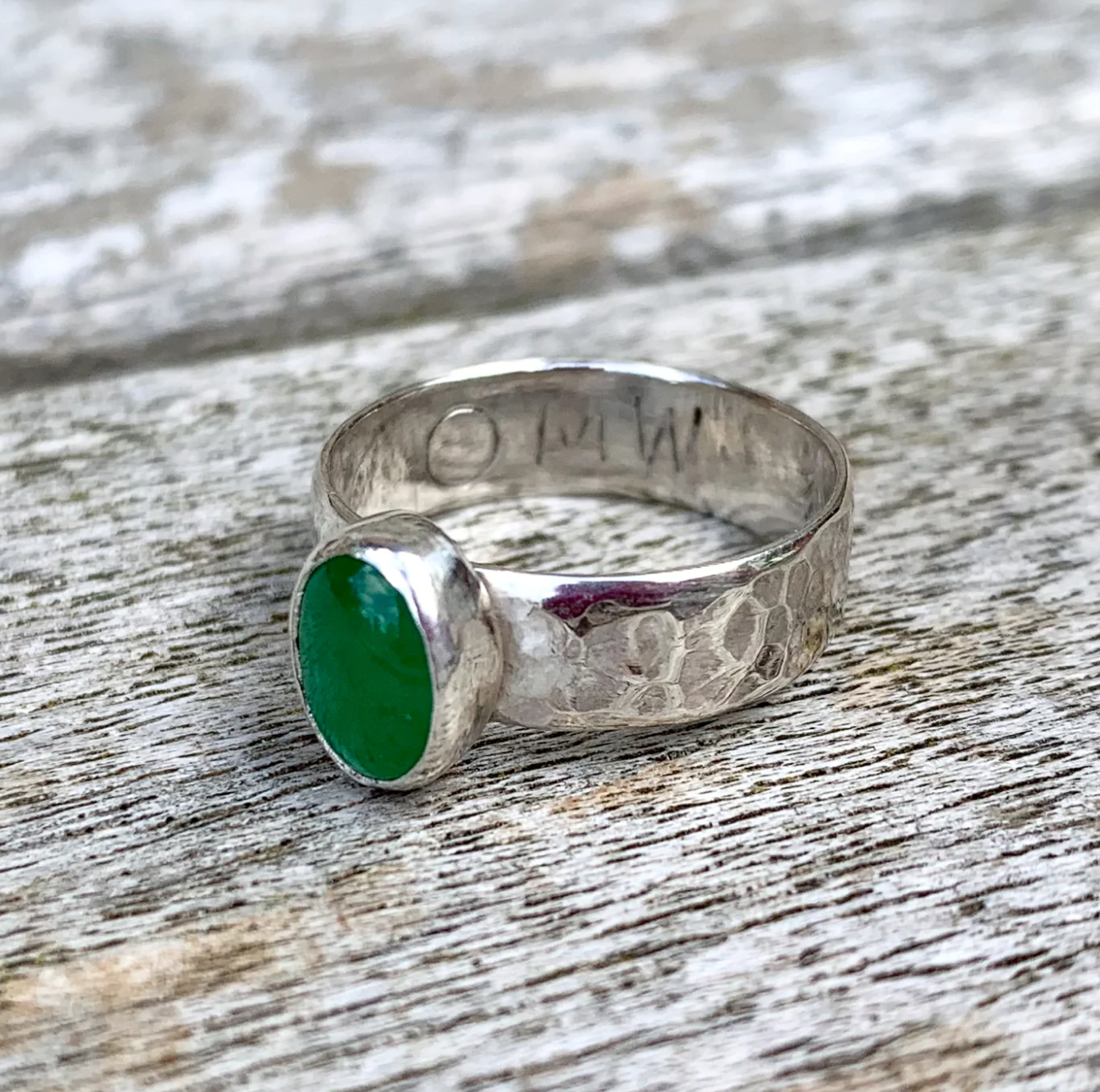 Small oval gemstone ring with engraving
