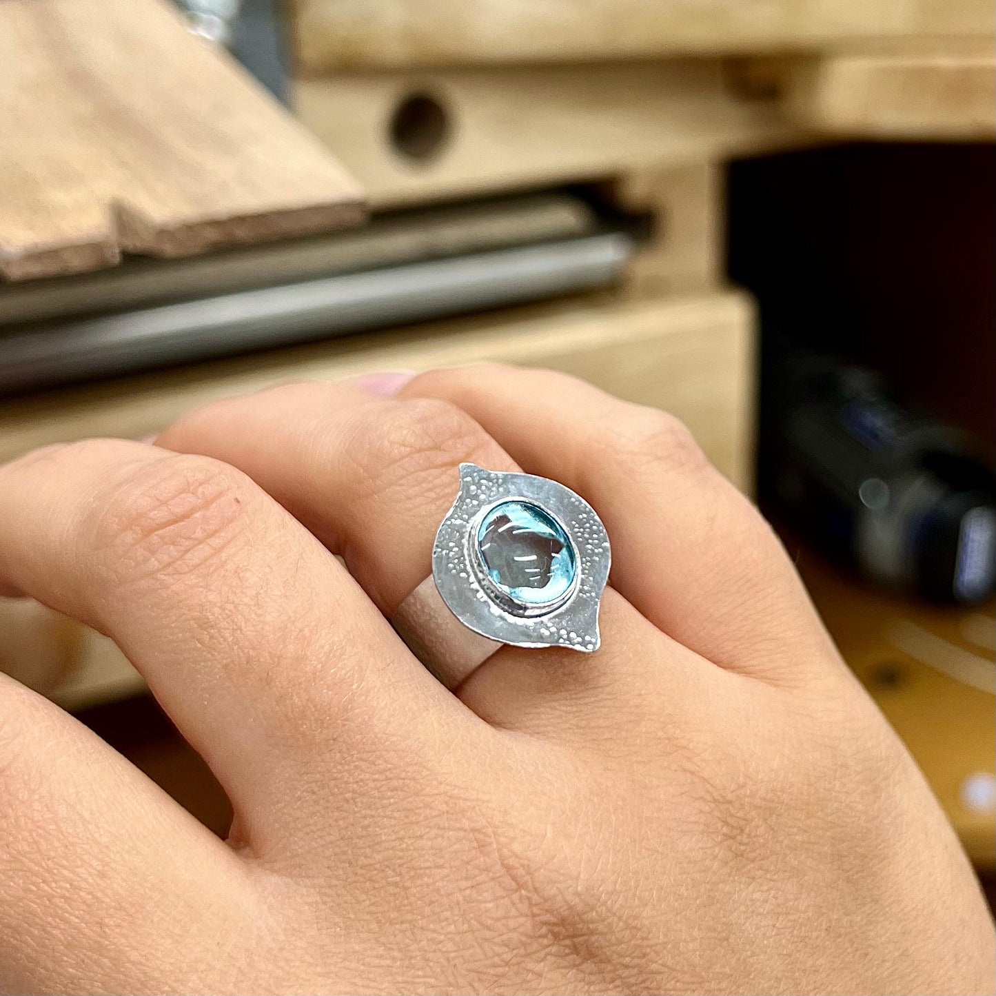 Drop sky blue topaz ring