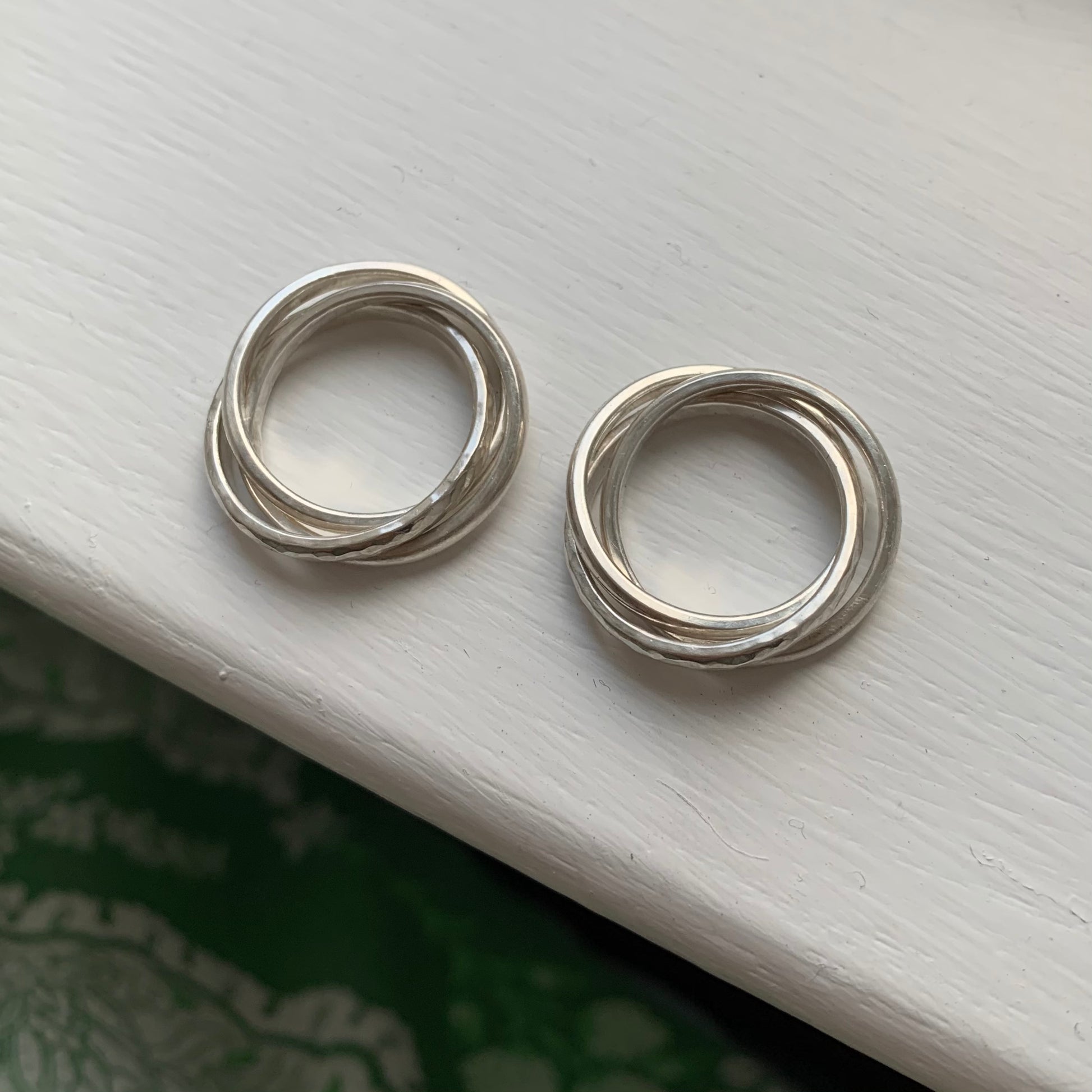 Two sterling silver russian wedding rings.