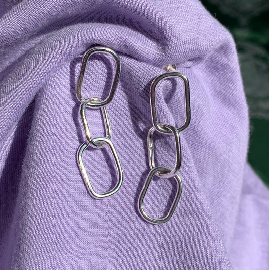 Sterling silver rectangular pastille triple-chain link earrings.