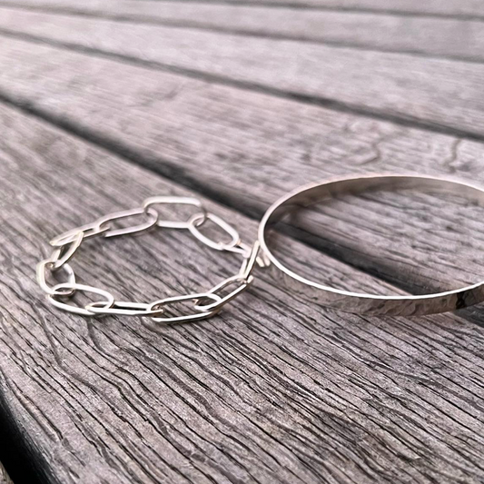 A handmade sterling silver oval chain link bracelet.