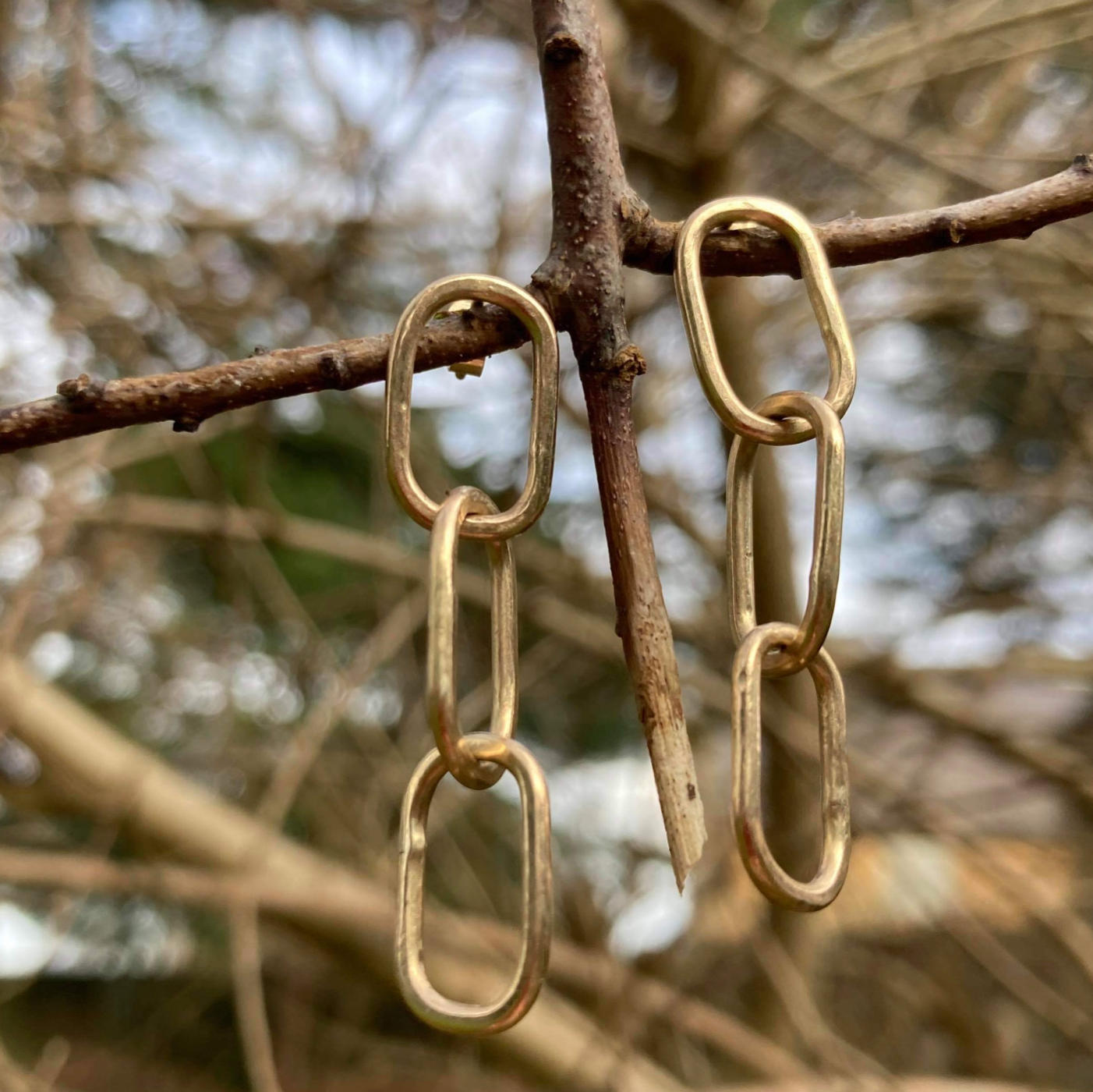 Handmade 9ct yellow gold triple-chain link pastille earrings.
