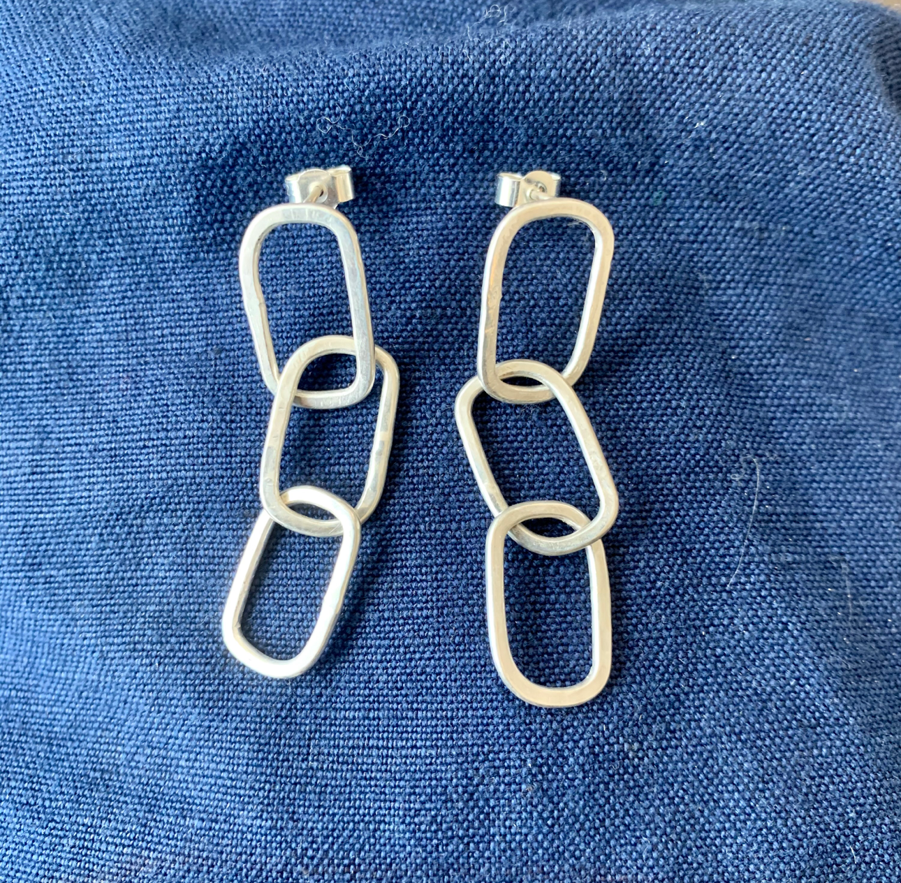 Handmade 9ct white gold triple-chain link pastille earrings.