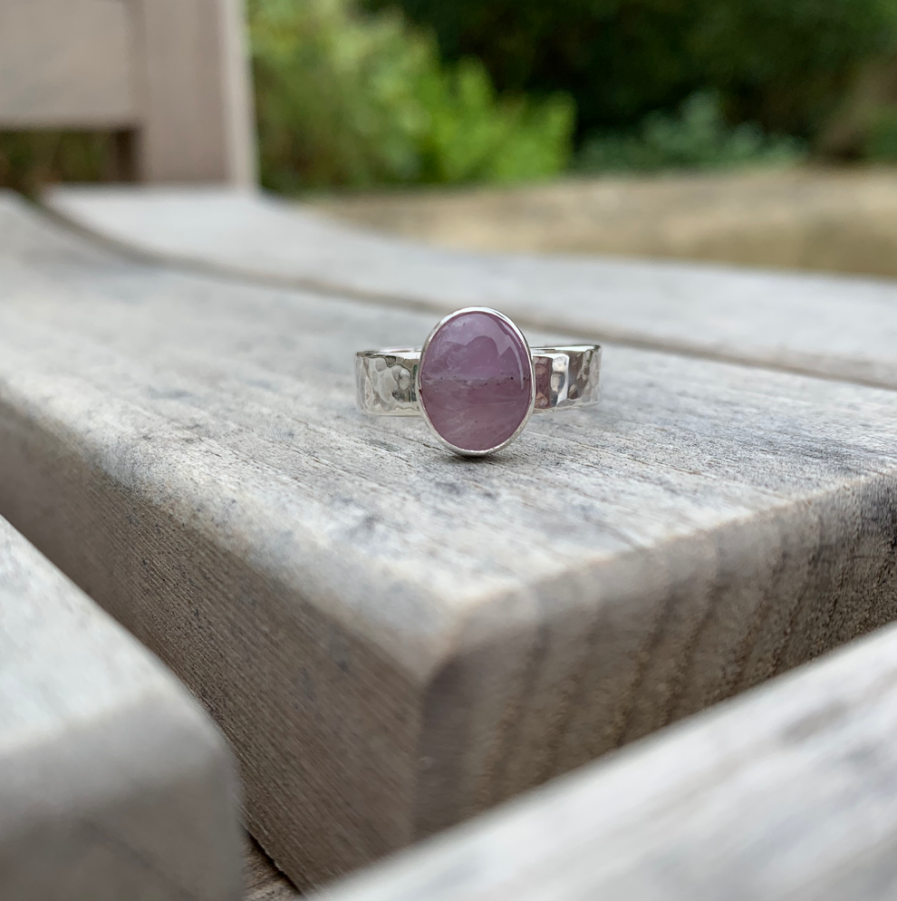 Large oval gemstone ring with engraving