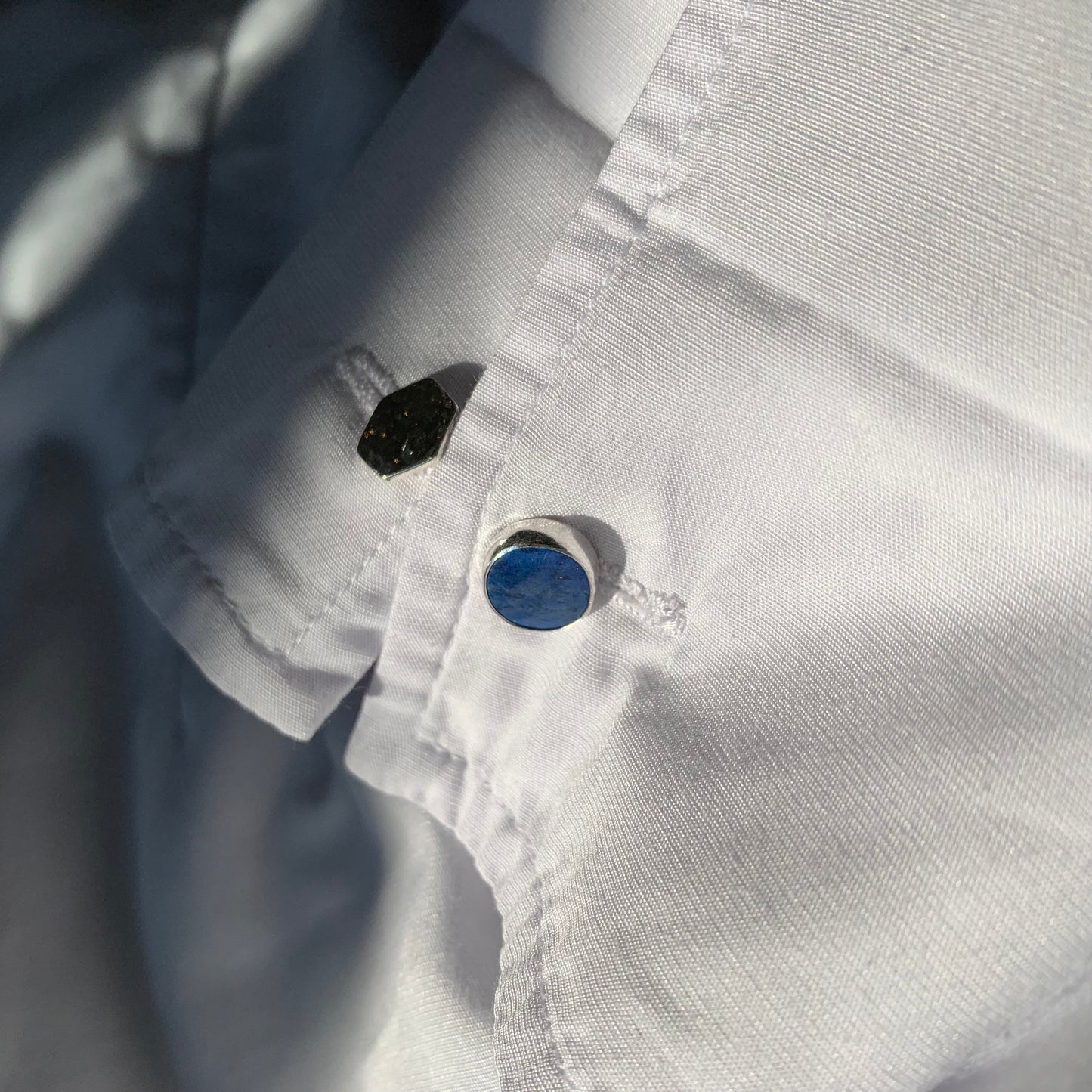 Lapis lazuli cufflinks in a white shirt