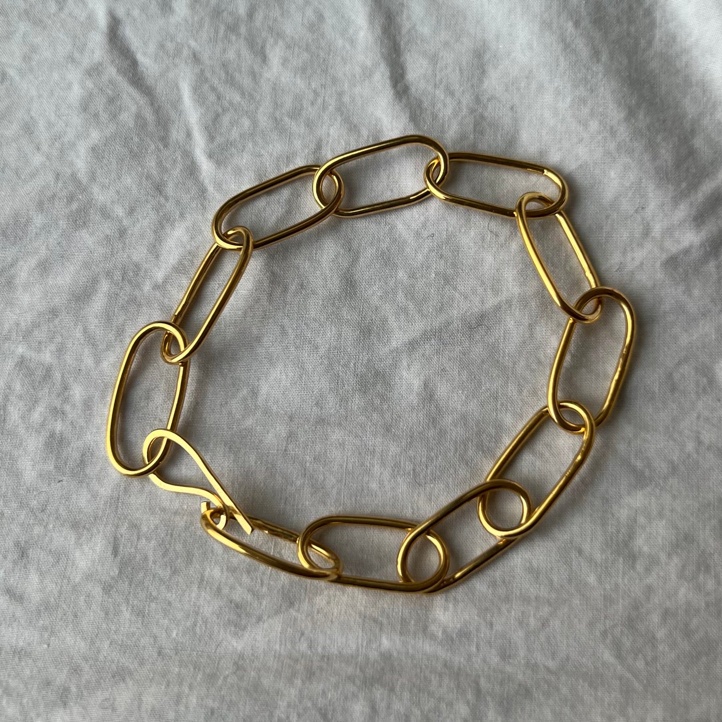 A handmade gold vermeil oval chain link bracelet.